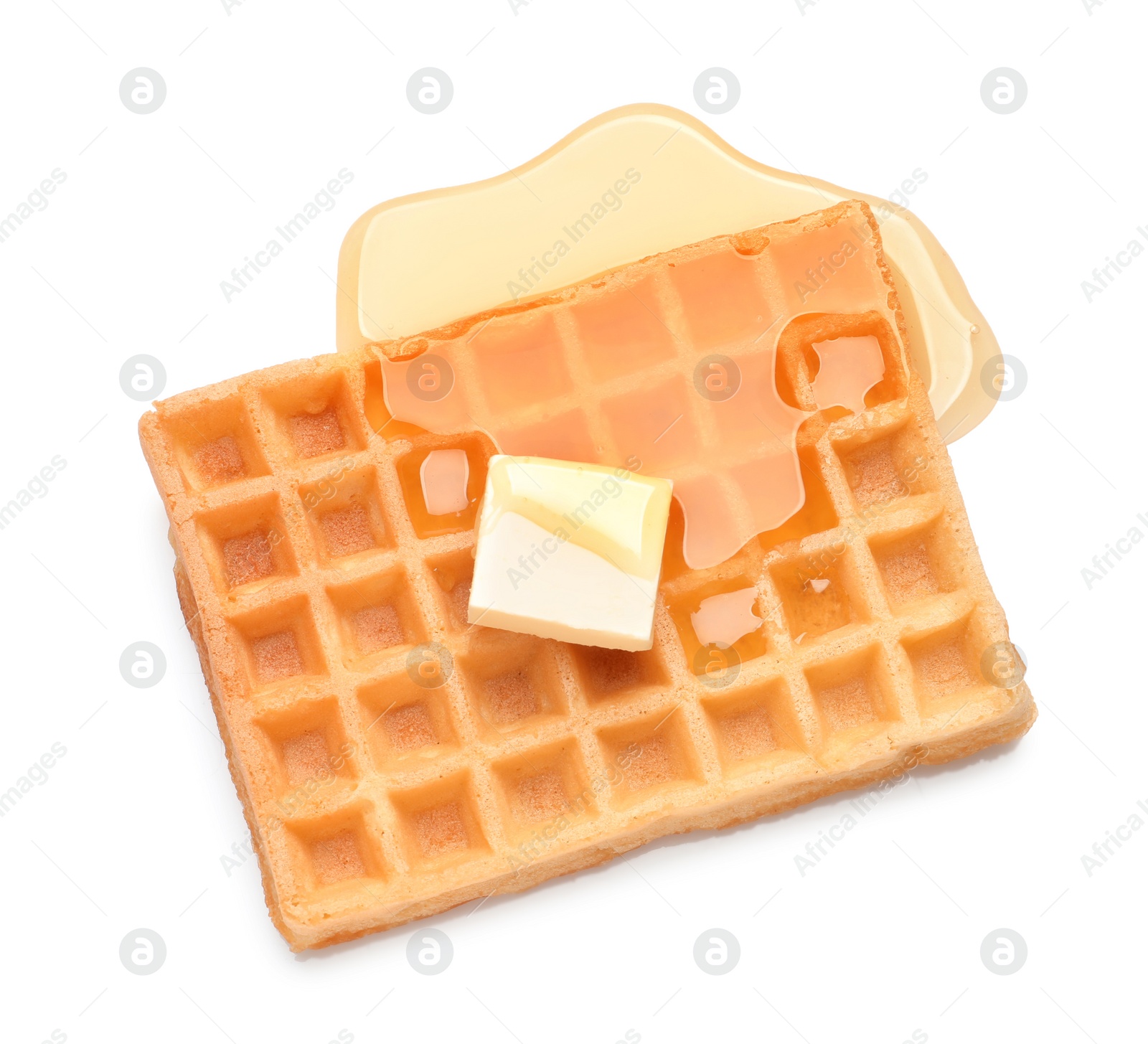 Photo of Delicious waffle with butter and honey on white background, top view