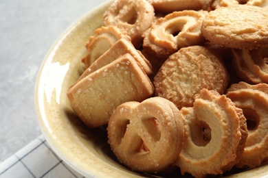 Bowl with Danish butter cookies on table, closeup