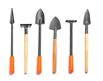 Set of gardening tools on white background, top view