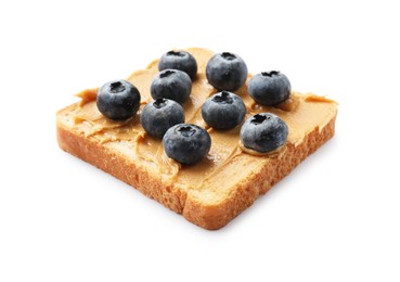 Photo of Tasty peanut butter sandwich with fresh blueberries isolated on white