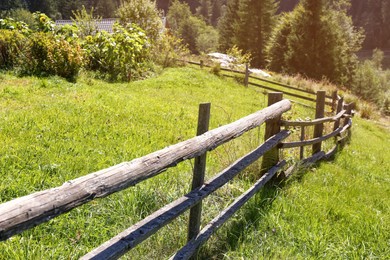 Beautiful view of mountain countryside with wooden fence