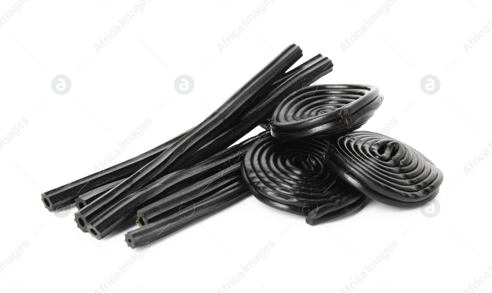 Photo of Pile of tasty liquorice candies on white background