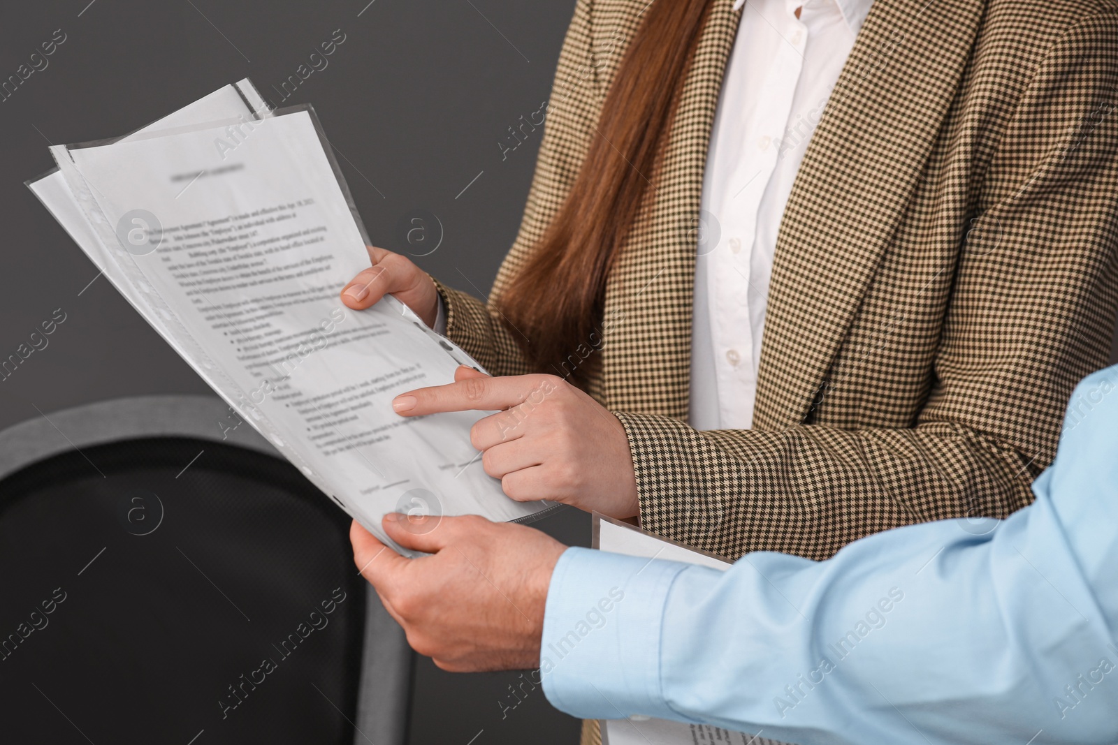 Photo of Businesspeople working with documents in office, closeup