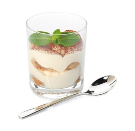 Photo of Delicious tiramisu in glass, mint leaves and spoon isolated on white