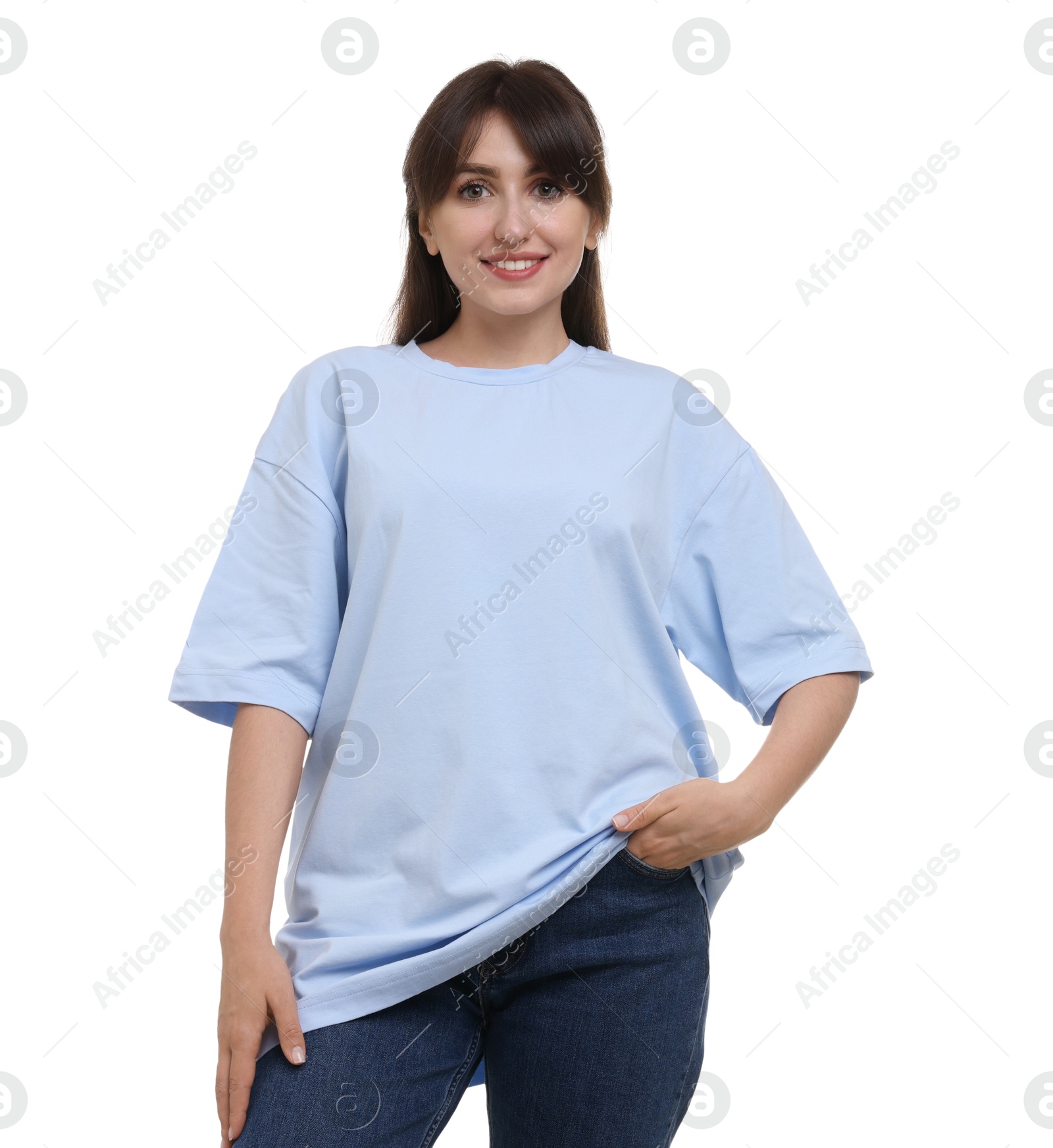 Photo of Smiling woman in stylish light blue t-shirt on white background