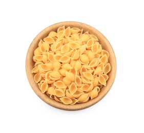 Photo of Raw conchiglie pasta in bowl isolated on white, top view