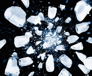 Image of Crushed ice in air on black background