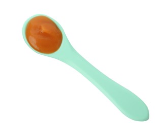 Spoon of tasty pureed baby food isolated on white, top view