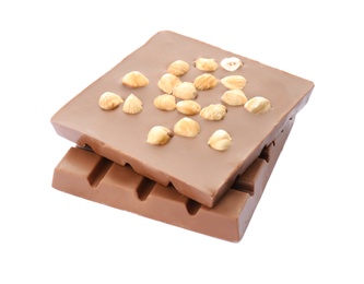 Photo of Delicious milk chocolate bars with nuts on white background