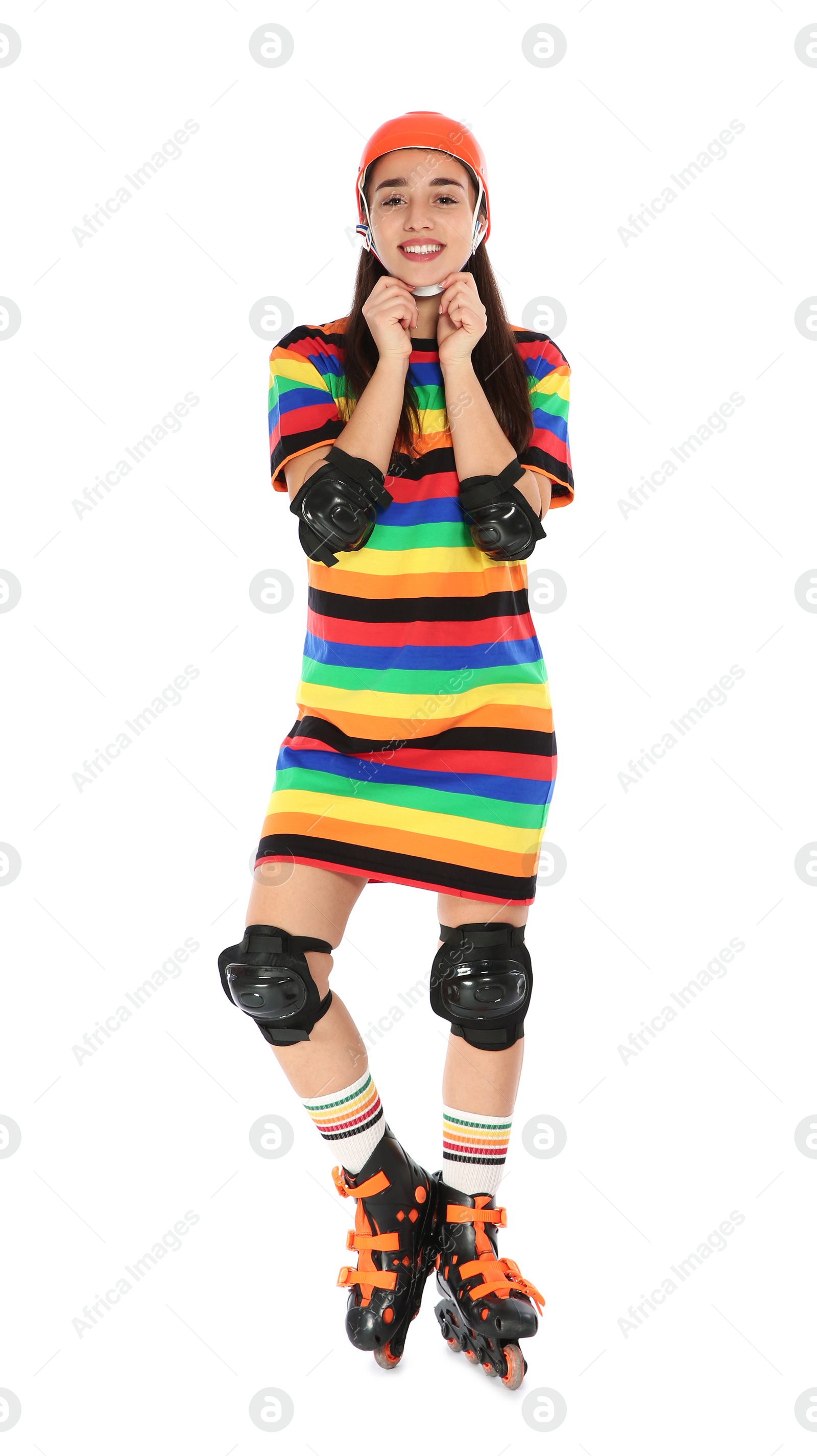 Photo of Full length portrait of young woman in bright dress with roller skates on white background