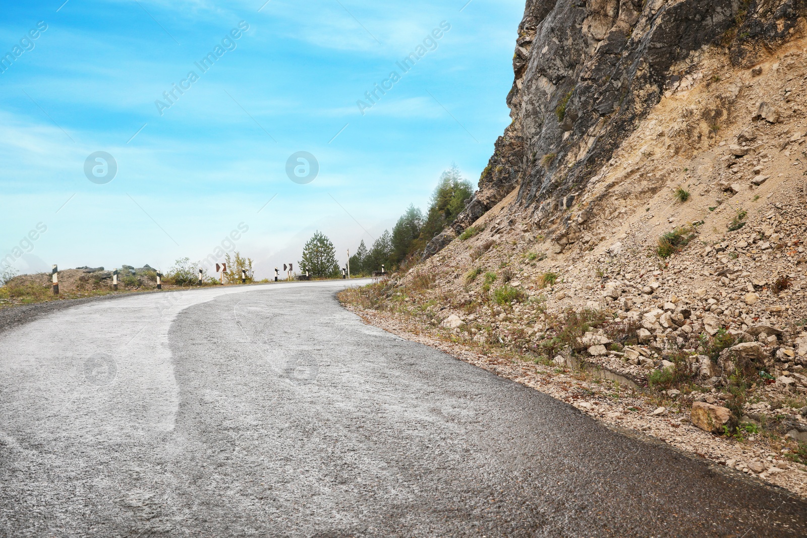 Photo of Picturesque view of empty road near mountains