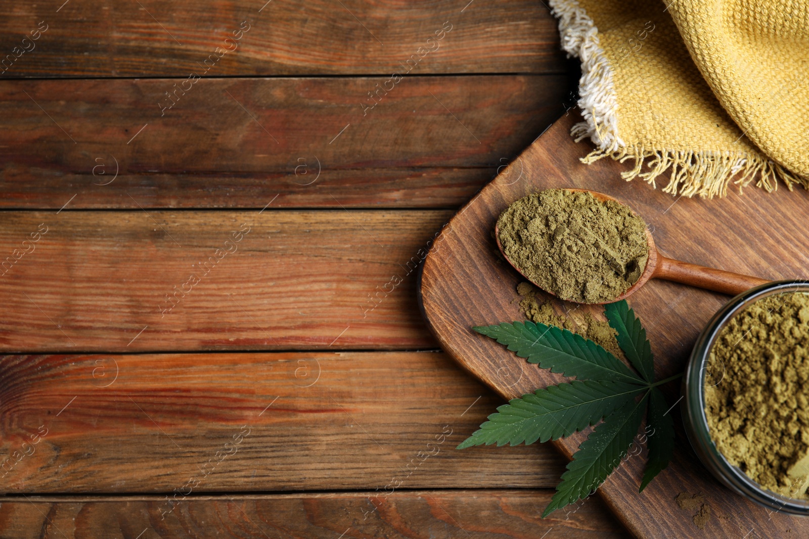 Photo of Hemp protein powder and fresh leaf on wooden table, flat lay. Space for text