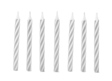 Photo of Silver striped birthday candles isolated on white