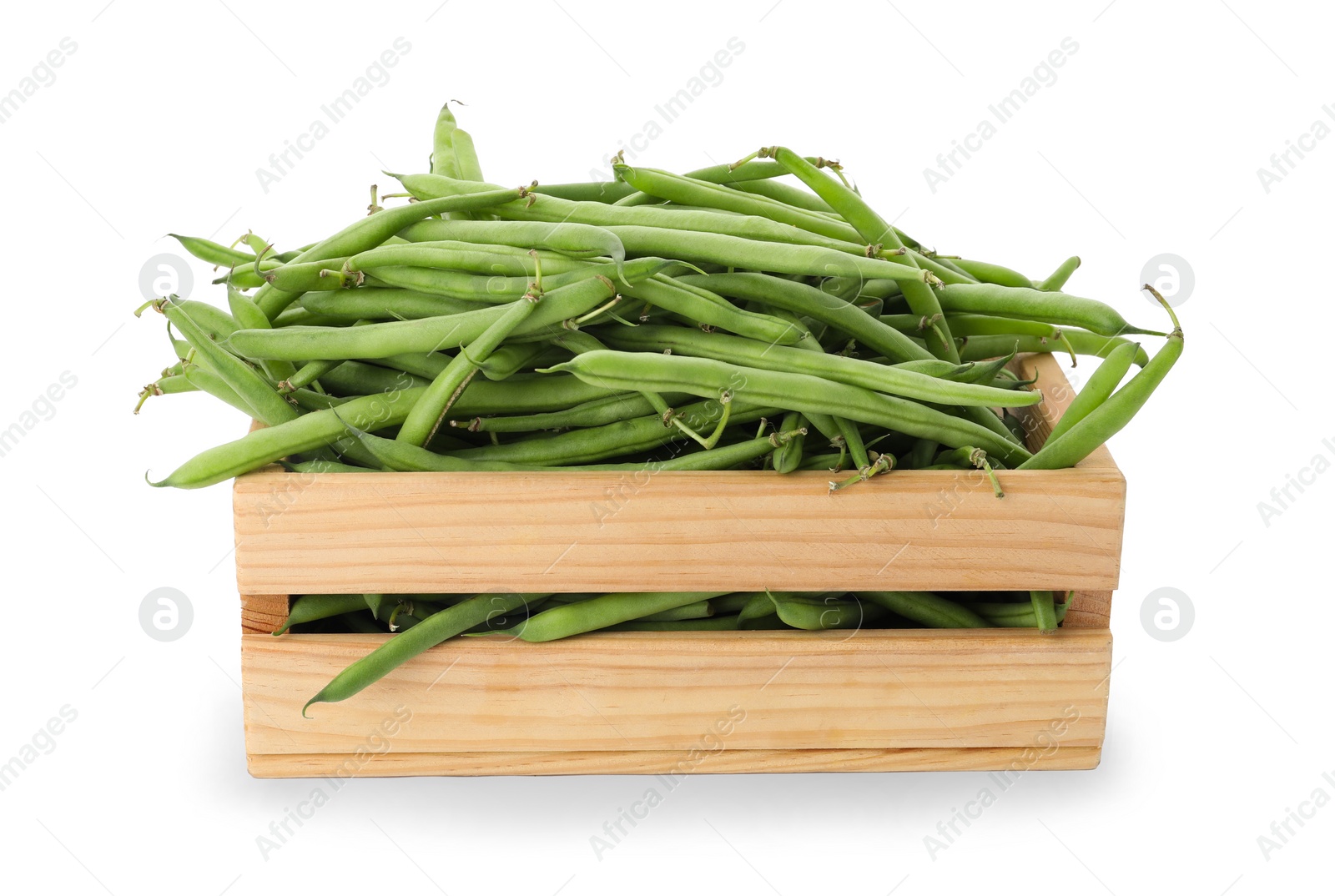 Photo of Fresh green beans in wooden crate on white background