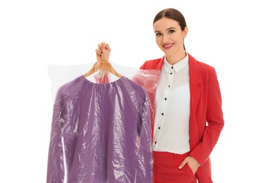 Photo of Young woman holding hanger with sweatshirt on white background. Dry-cleaning service