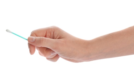 Photo of Woman holding used cotton swab on white background, closeup