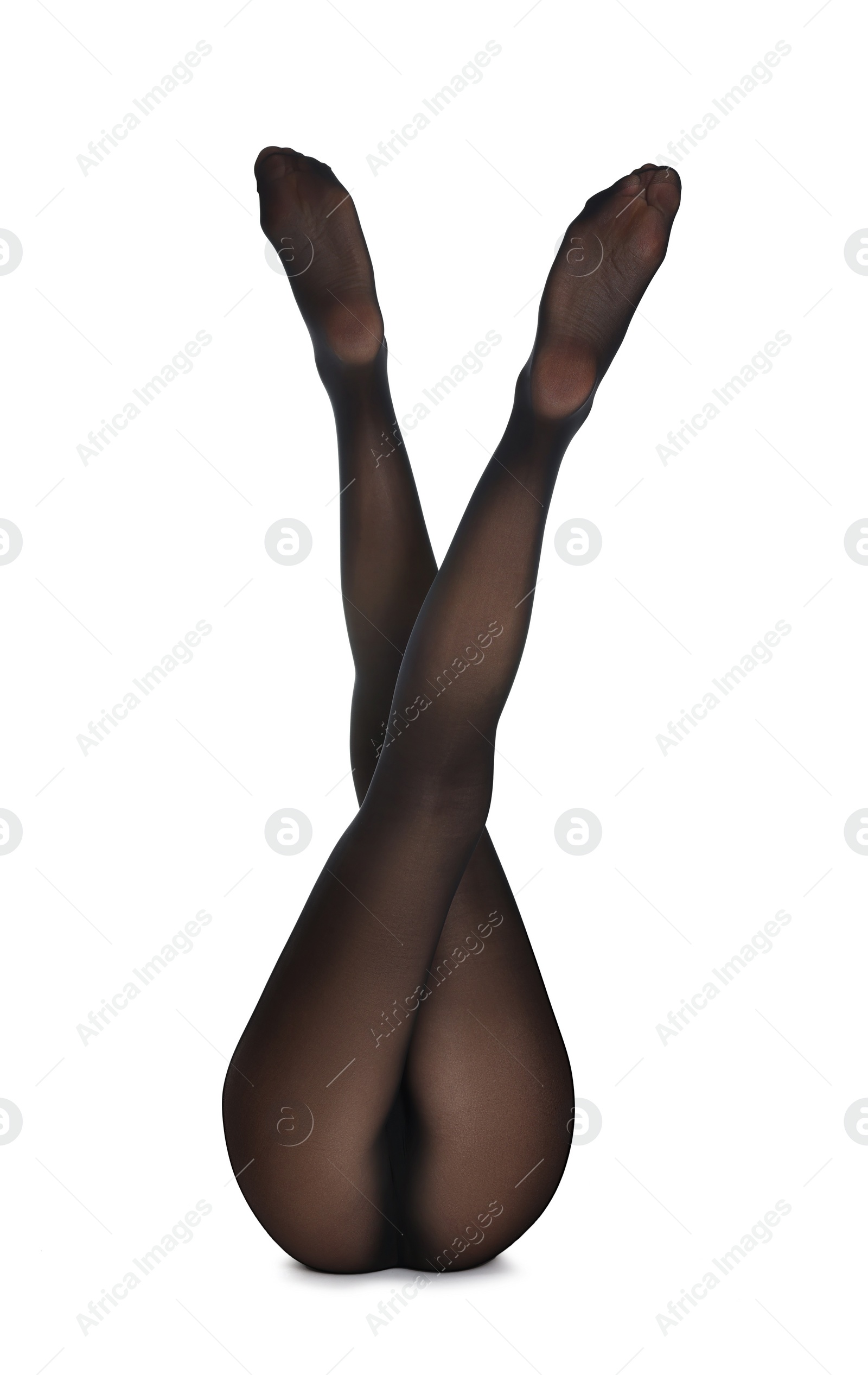 Photo of Woman with beautiful long legs wearing black tights on white background