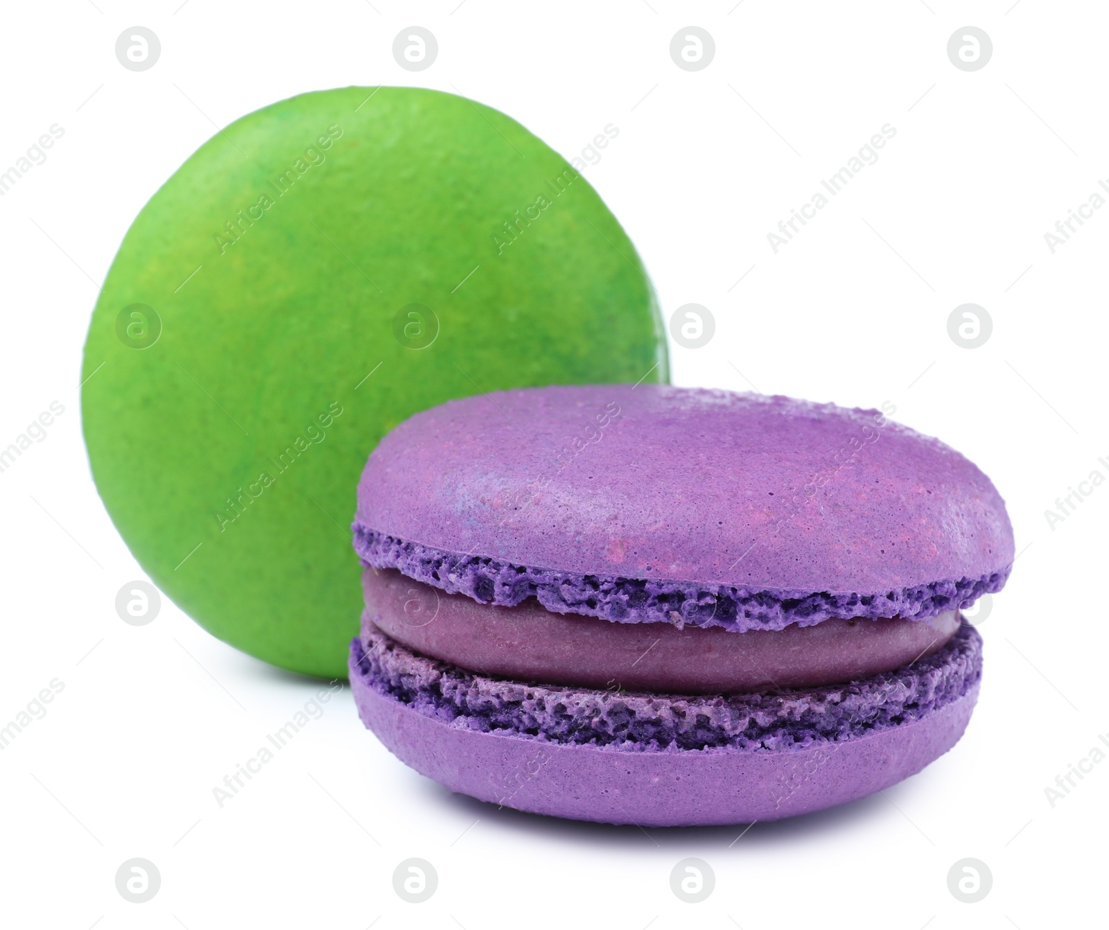 Photo of Different delicious colorful macarons on white background