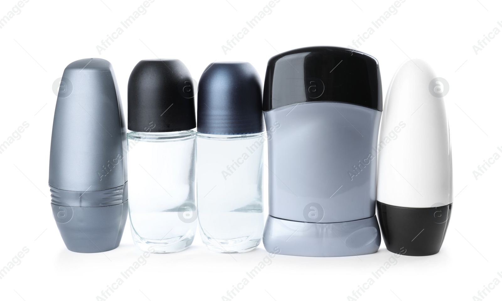 Photo of Different natural male deodorants on white background. Skin care