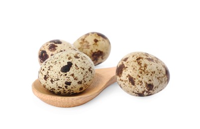 Wooden spoon and quail eggs on white background