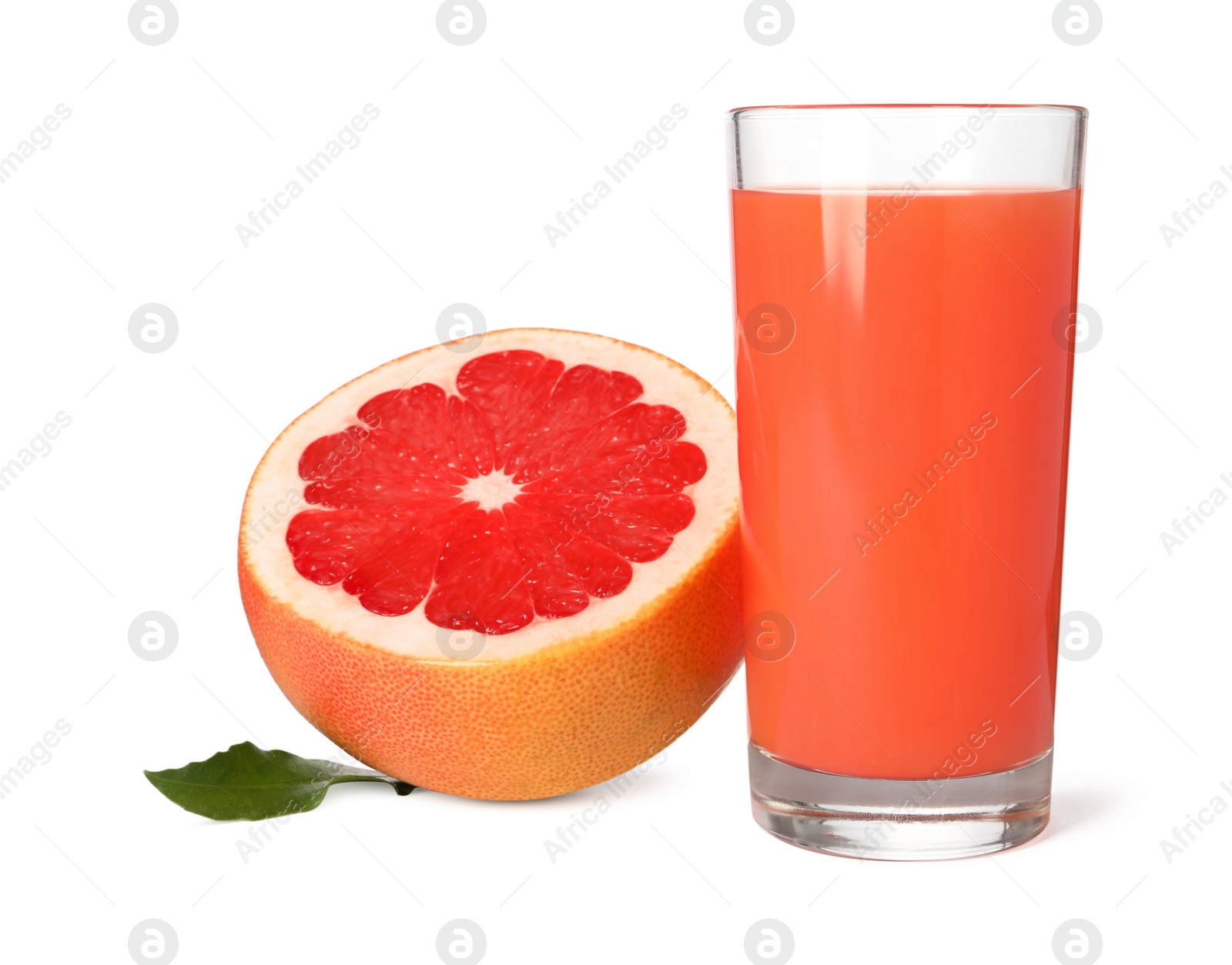 Photo of Tasty grapefruit juice in glass, fresh fruit and green leaf isolated on white