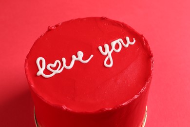 Bento cake with text Love You on red table, closeup. St. Valentine's day surprise