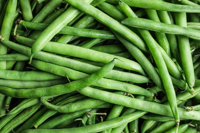 Fresh green beans as background, top view