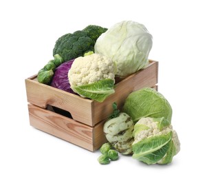 Wooden crate with different types of fresh cabbage on white background