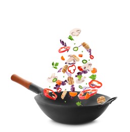 Image of Different tasty ingredients falling into wok on white background