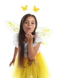 Cute little girl in fairy costume with yellow wings on white background