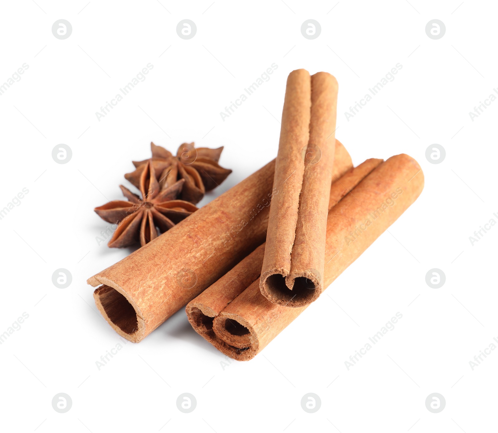 Photo of Cinnamon sticks and anise stars isolated on white