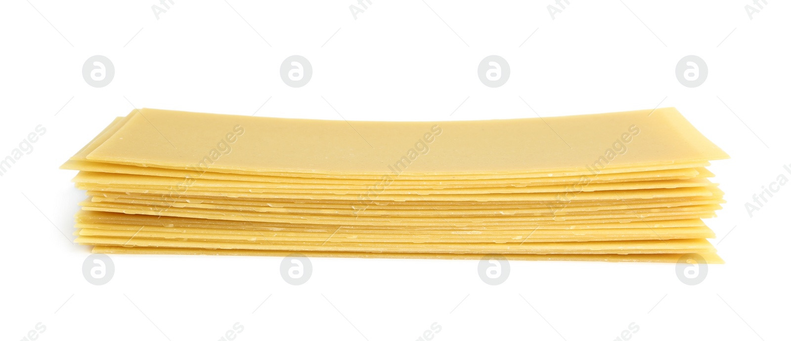 Photo of Stack of uncooked lasagna sheets isolated on white