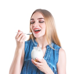 Young woman with yogurt on white background