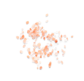 Photo of Scattered pink himalayan salt on white background, top view