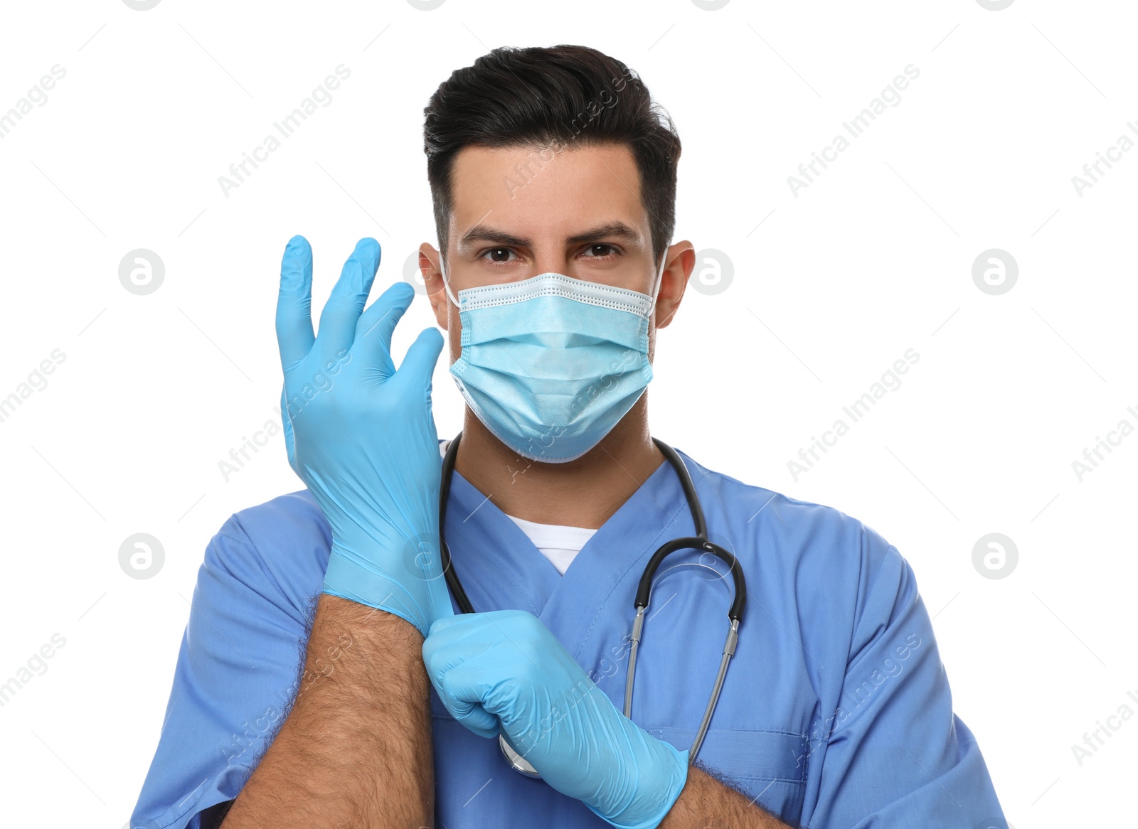 Photo of Doctor in protective mask putting on medical gloves against white background