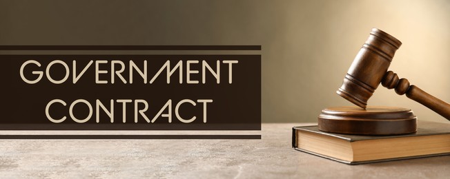 Image of Words Government Contract and wooden gavel on table, banner design