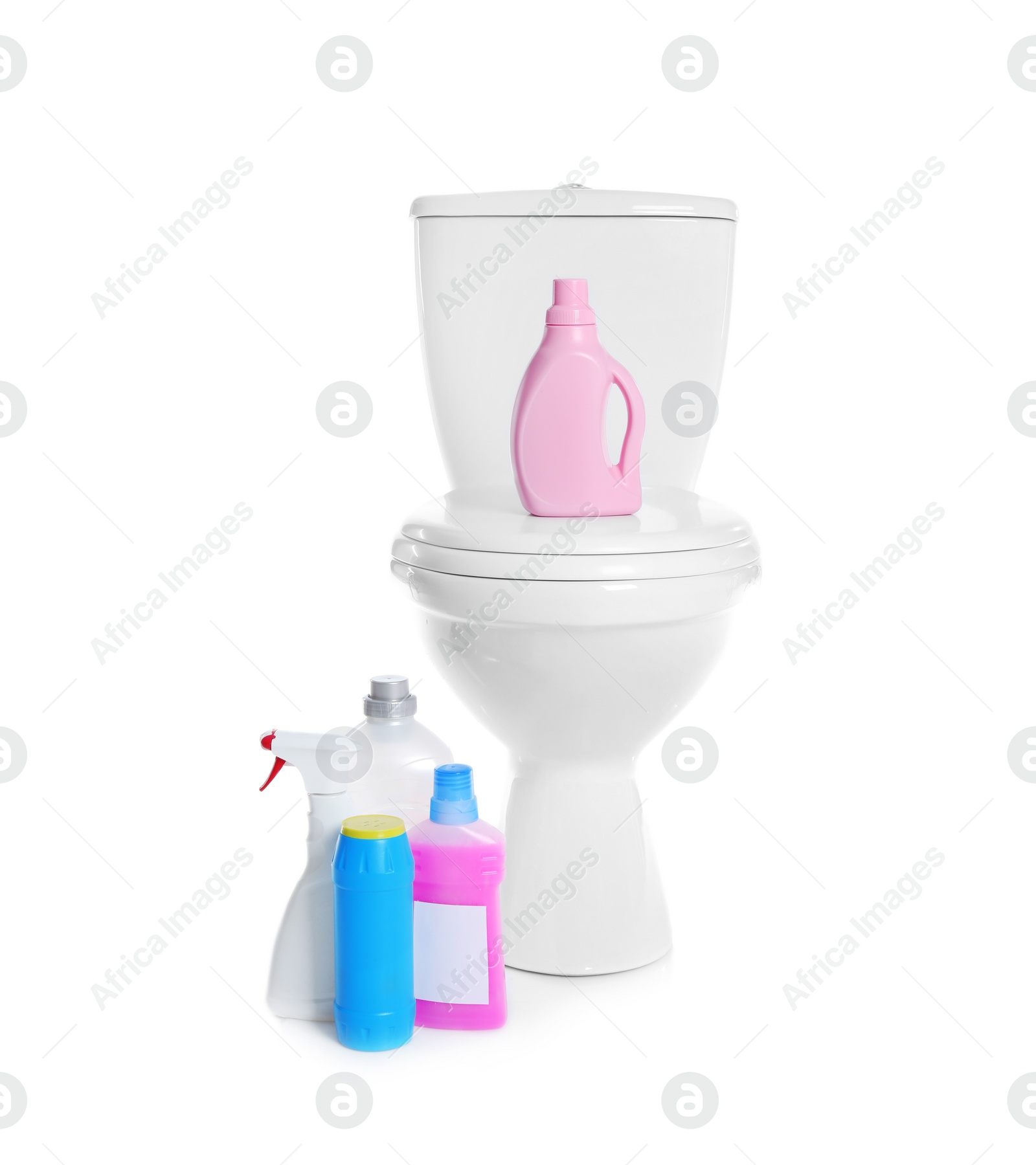 Photo of New ceramic toilet bowl and bottles of detergent on white background