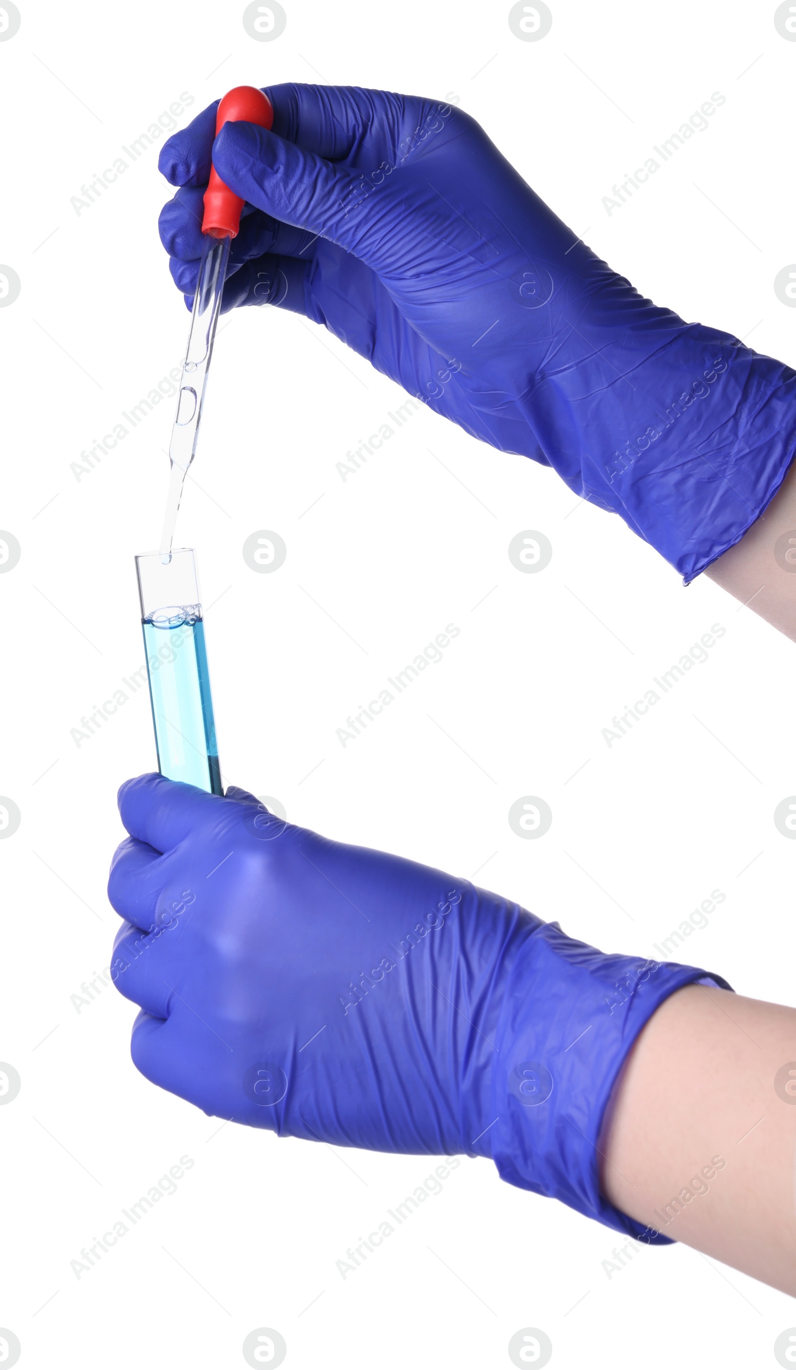 Photo of Scientist dripping liquid from pipette into test tube on white background, closeup
