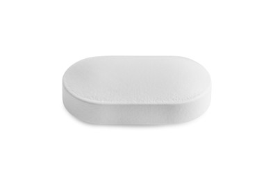 Photo of One pill on white background. Medicinal treatment