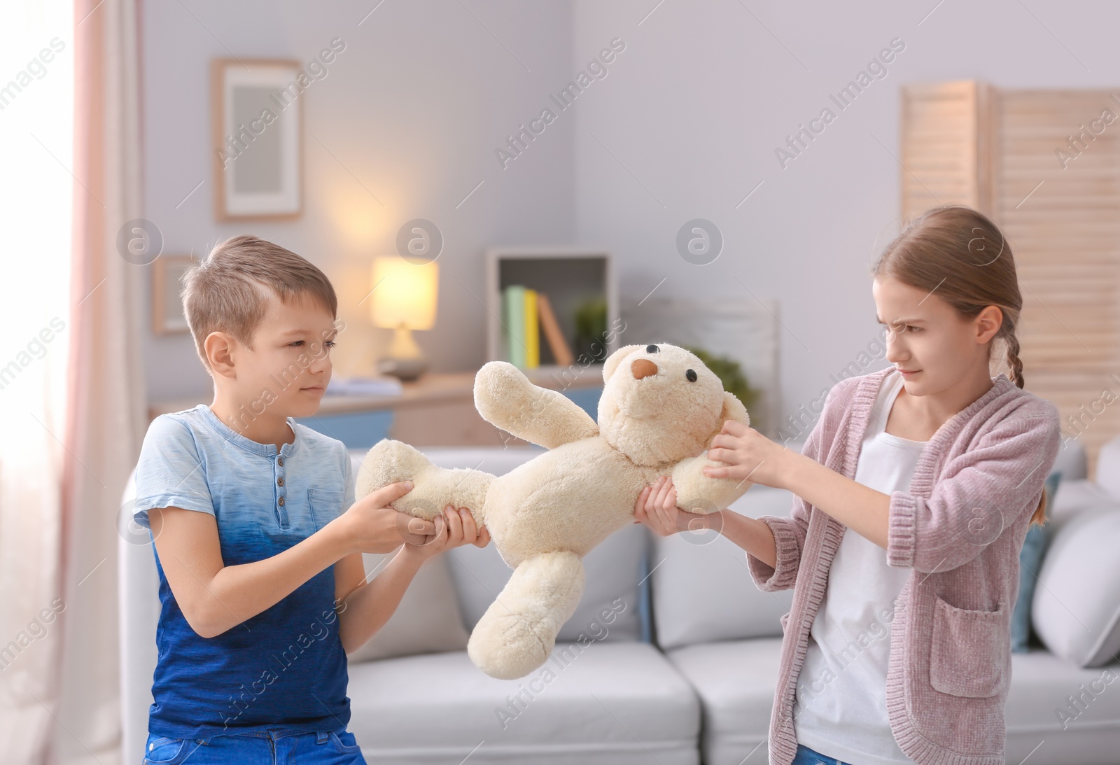 Photo of Brother arguing with sister at home