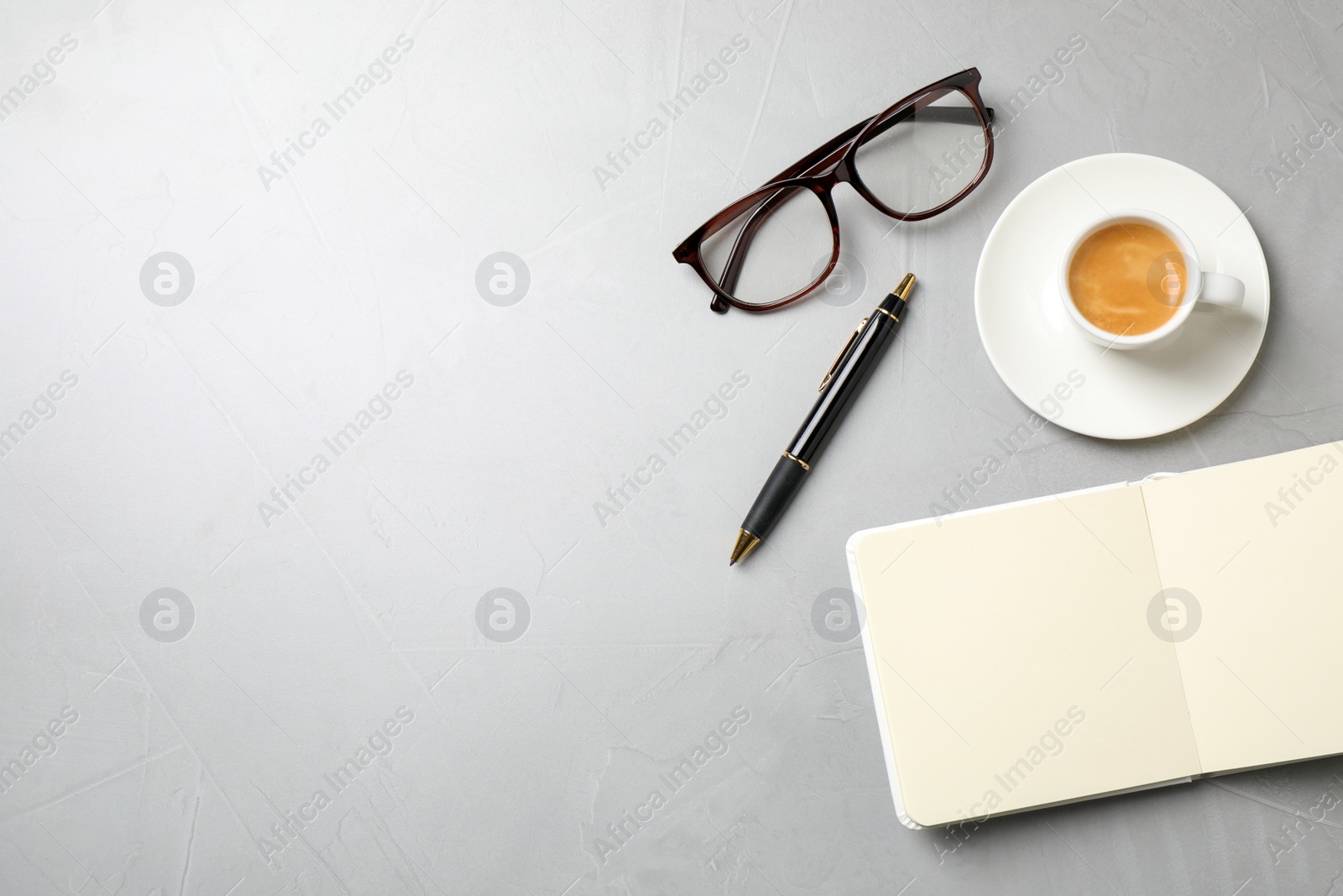 Photo of Flat lay composition with coffee on grey table, space for text. Tasty breakfast