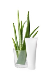 Photo of Aloe vera toothpaste in blank tube and green leaves isolated on white