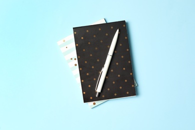 Photo of Different school stationery on light blue background, flat lay. Back to school