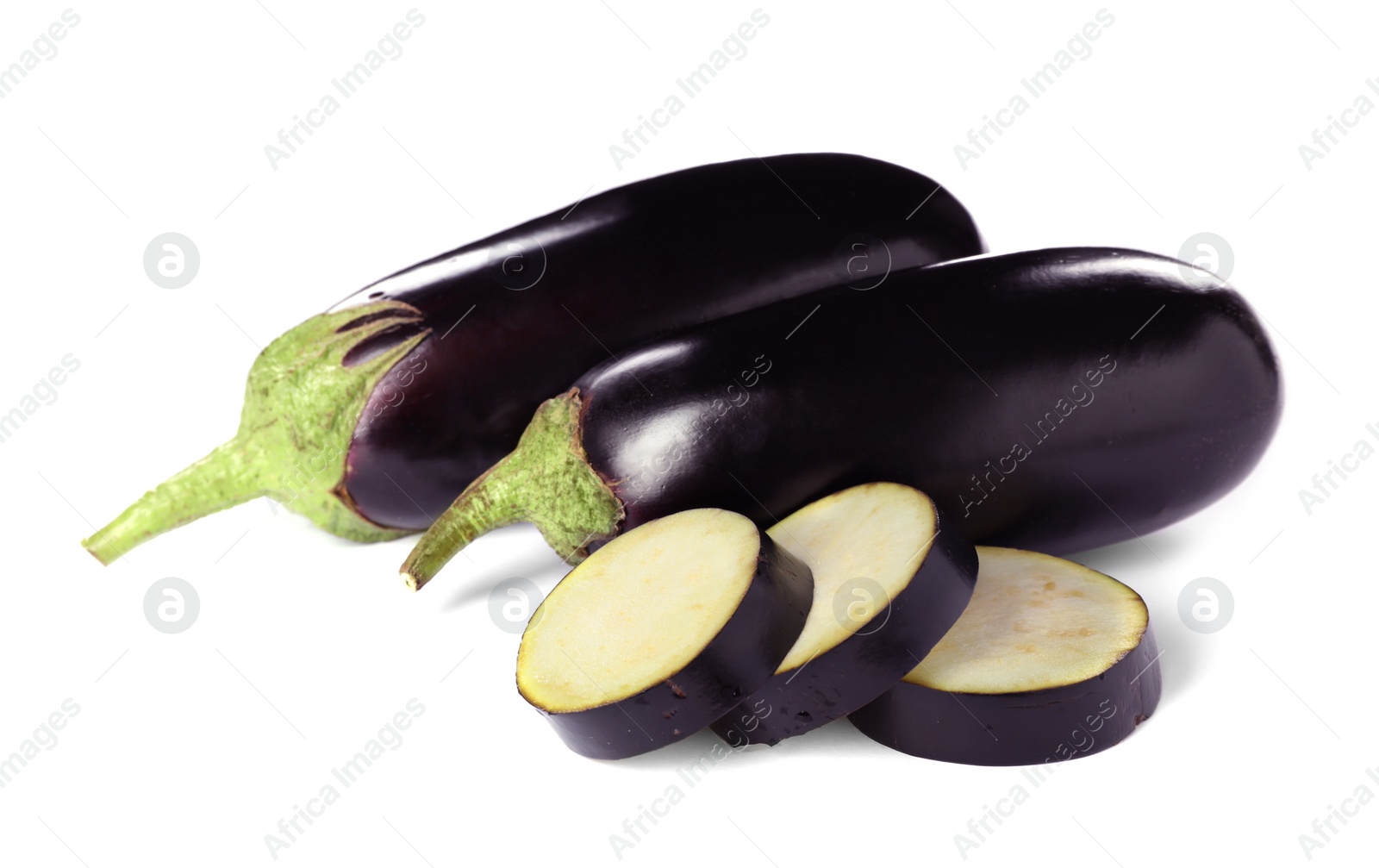 Photo of Tasty raw ripe eggplants on white background