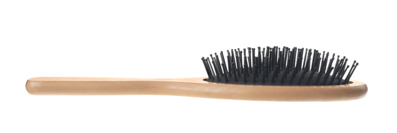 New wooden hair brush isolated on white