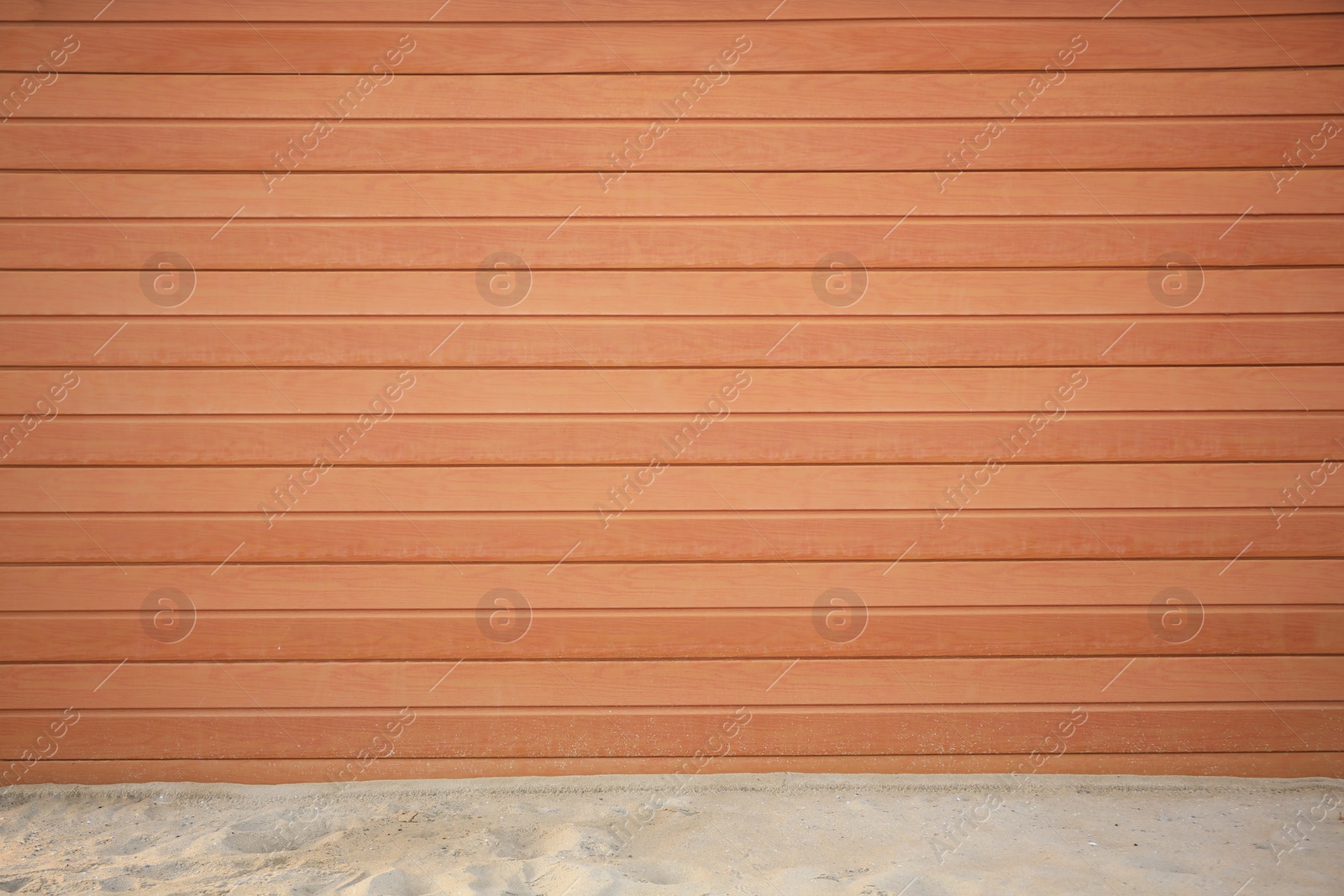 Photo of View on urban wooden wall and sand