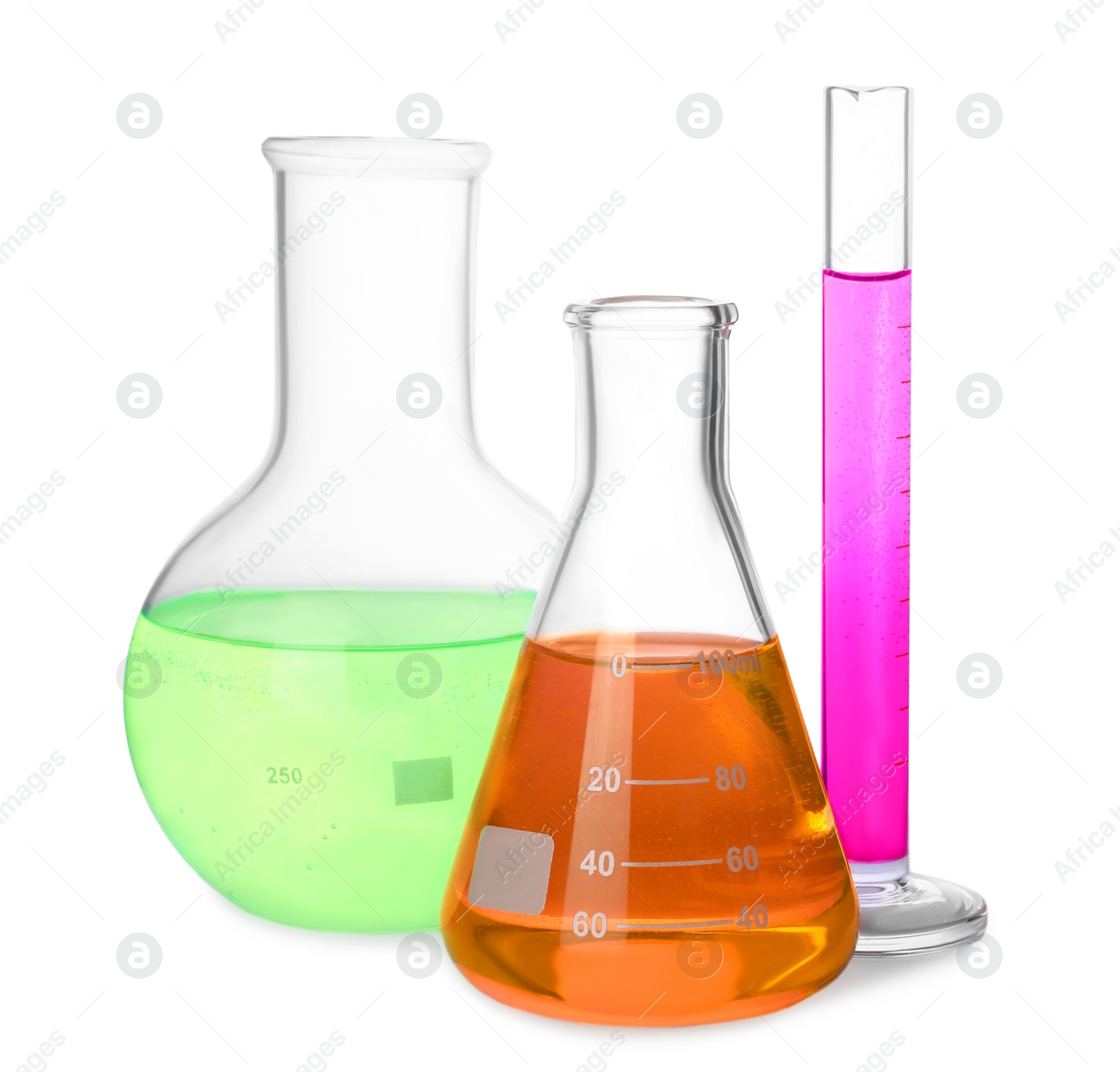Photo of Different laboratory glassware with colorful liquids on white background