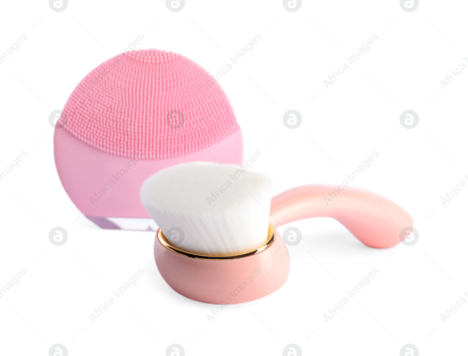 Photo of Face cleansing brushes isolated on white. Cosmetic tools