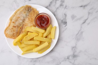 Photo of Delicious fish and chips with ketchup on light marble table, top view. Space for text