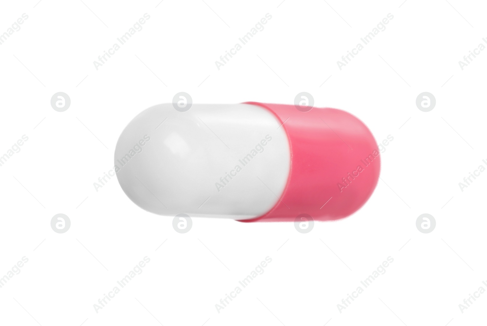 Photo of One pill isolated on white. Medicinal treatment